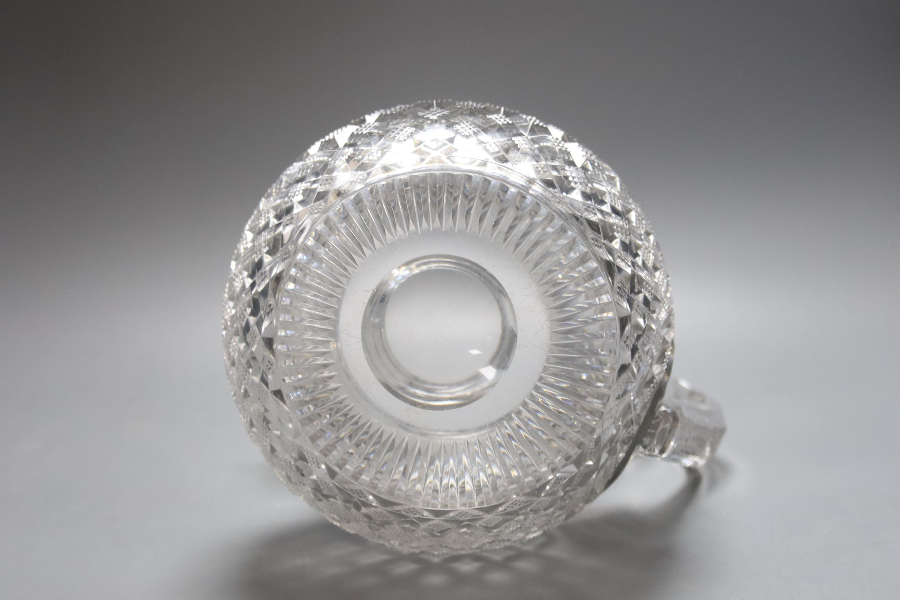 A Regency Irish Waterford crystal jug 16cm, crack to base of handle